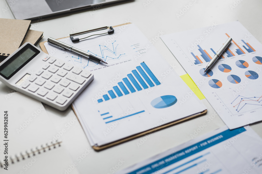 Finance and accounting paperwork on office desk. Finance and accounting paperwork on office desk.