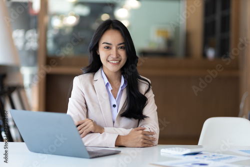 Portrait of an attractive Asian businesswoman in the office. © Wasan