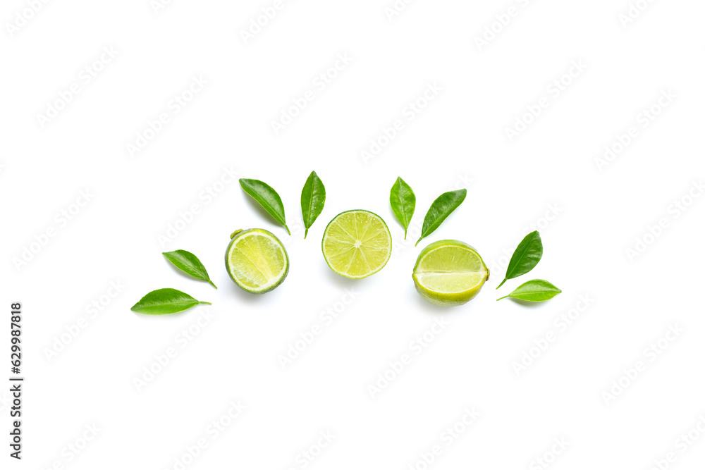 Limes with leaves isolated on white background. Limes with leaves isolated on white background.
