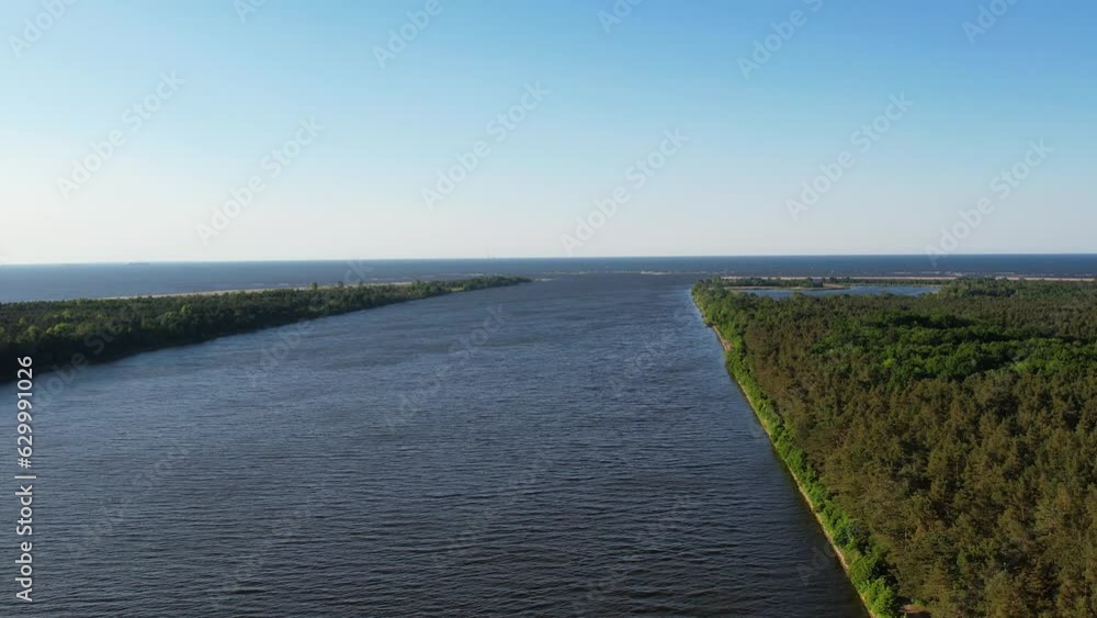The Vistula Spit ship canal aerial view. Establishing shot of canal across the Vistula Spit. Gulf od Gdansk, Poland. The Vistula Spit ship canal aerial view. Establishing shot of canal across the Vistula Spit. Gulf od Gdansk, Poland.