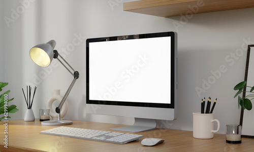 A modern PC computer blank screen mockup is on a table in a modern minimal home office. 3d render illustration © MeepianGraphic
