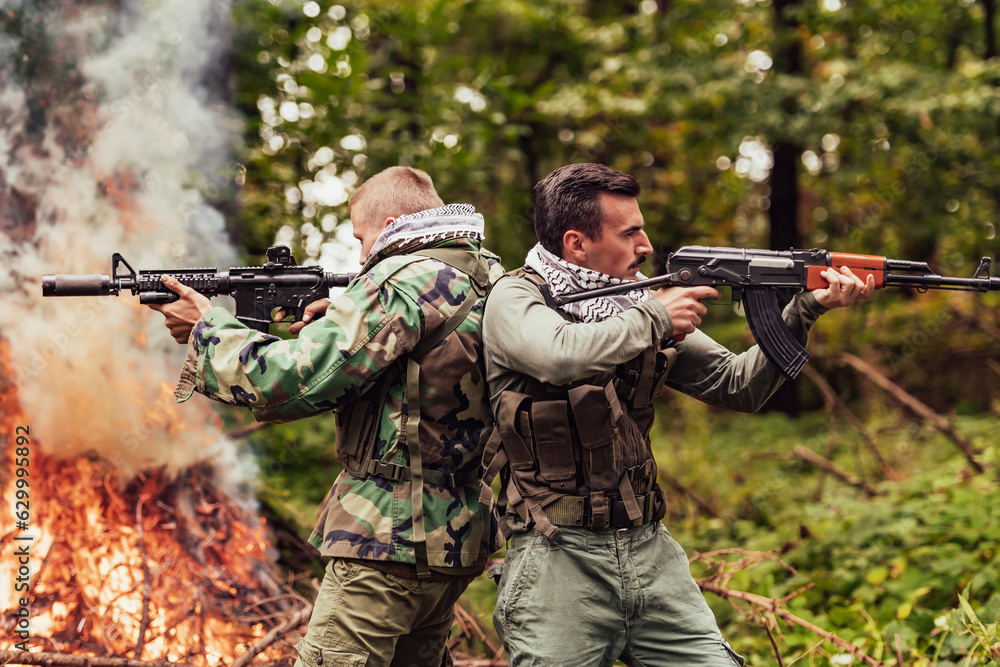 Fototapeta premium Angry terrorist militant guerrilla soldier warrior in forest