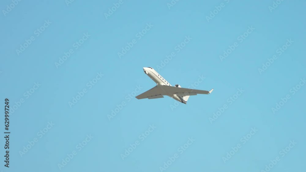 New Generic Unmarked Private Executive VIP Jet Airplane Flying Into a Clear Blue Sky After Taking Off on a Sunny Day New Generic Unmarked Private Executive VIP Jet Airplane Flying Into a Clear Blue Sky After Taking Off on a Sunny Day