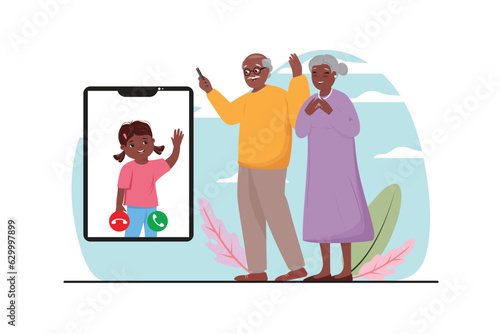 Elderly man and woman calling their granddaughter via video