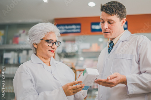 skilled pharmacist is consulting, analyzing the use of drugs to recommend and supervise patients according to prescriptions in modern pharmacies.
