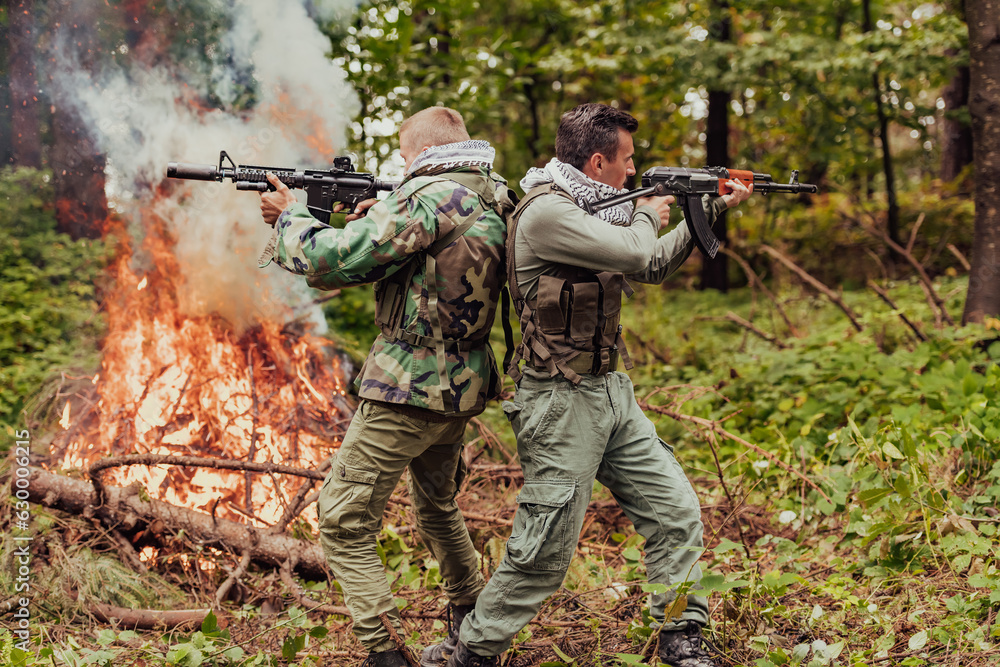 Fototapeta premium Angry terrorist militant guerrilla soldier warrior in forest