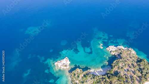 Fototapeta Naklejka Na Ścianę i Meble -  Aerial view of sea waves and fantastic Rocky coast, Greece