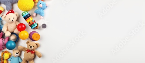 collection of baby and kids toys displayed on a white background. The view is from the top, and there