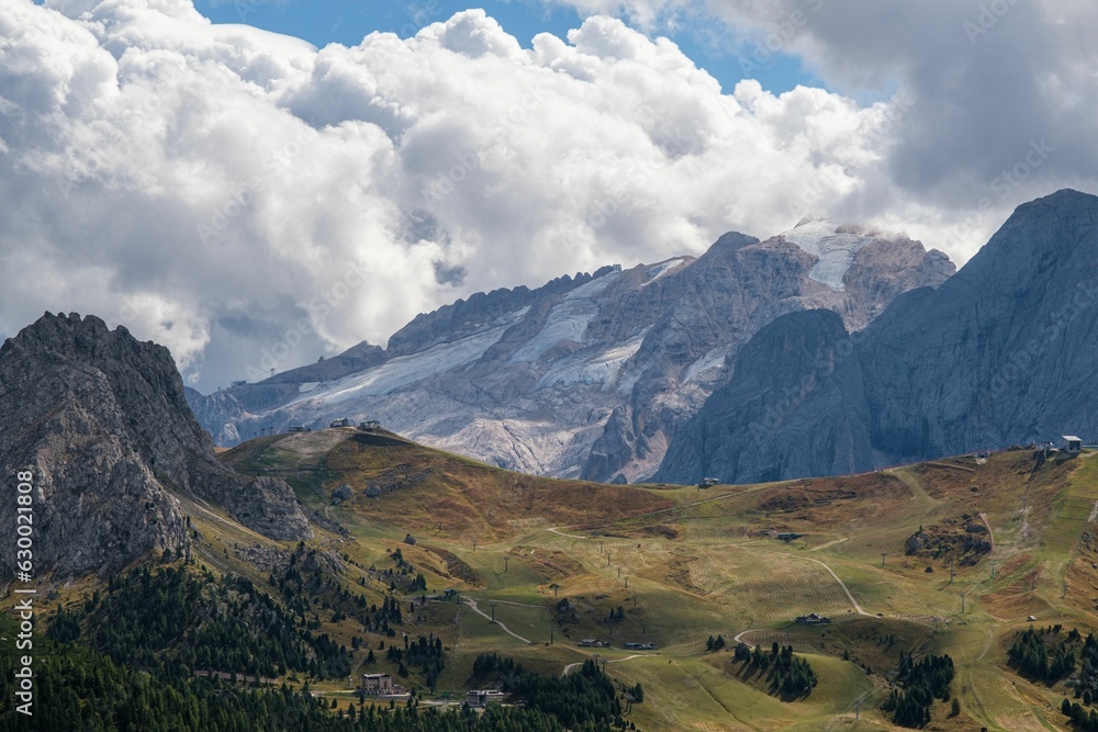 Glacier located at the Marmolada Mountain in the Dolomites, South Tyrol, Italy featured lush meadows