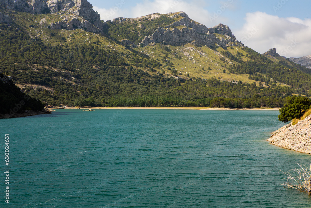 Obraz premium Hiking holidays Mallorca, Spain. Beautiful picture with landscape of Serra de Tramuntana mountains in the island of Majorca in Mediterranean sea. Paradise for bikers. Adventure travel.