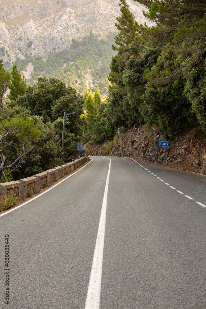 Hiking holidays Mallorca, Spain. Beautiful picture with landscape of Serra de Tramuntana mountains in the island of Majorca in Mediterranean sea. Paradise for bikers. Adventure travel.