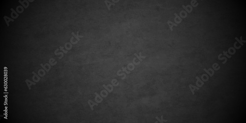 Abstract black stone wall texture grunge rock surface. dark gray background backdrop. wide panoramic banner. old wall stone for dark black distressed grunge background wallpaper rough concrete wall.