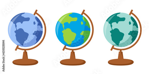 Three different globes on a white background. School globe. Isolated on a white background.	

