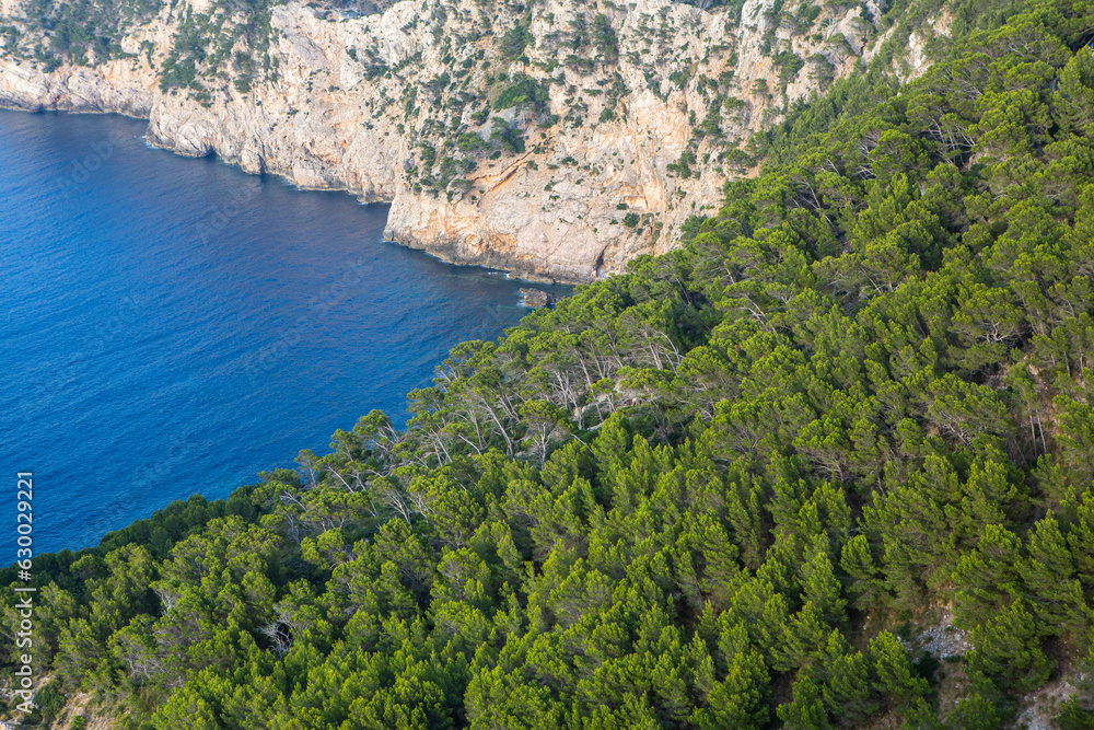 Obraz premium Hiking holidays Mallorca, Spain. Beautiful picture with landscape of Serra de Tramuntana mountains in the island of Majorca in Mediterranean sea. Paradise for bikers. Adventure travel.