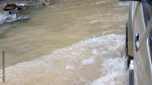 Wallpaper Mural Car traveling up the moauntain Passing through a natural path with a stream, a difficult road, full of trees on both sides of the road. The rainy atmosphere. POV driving.  Torontodigital.ca