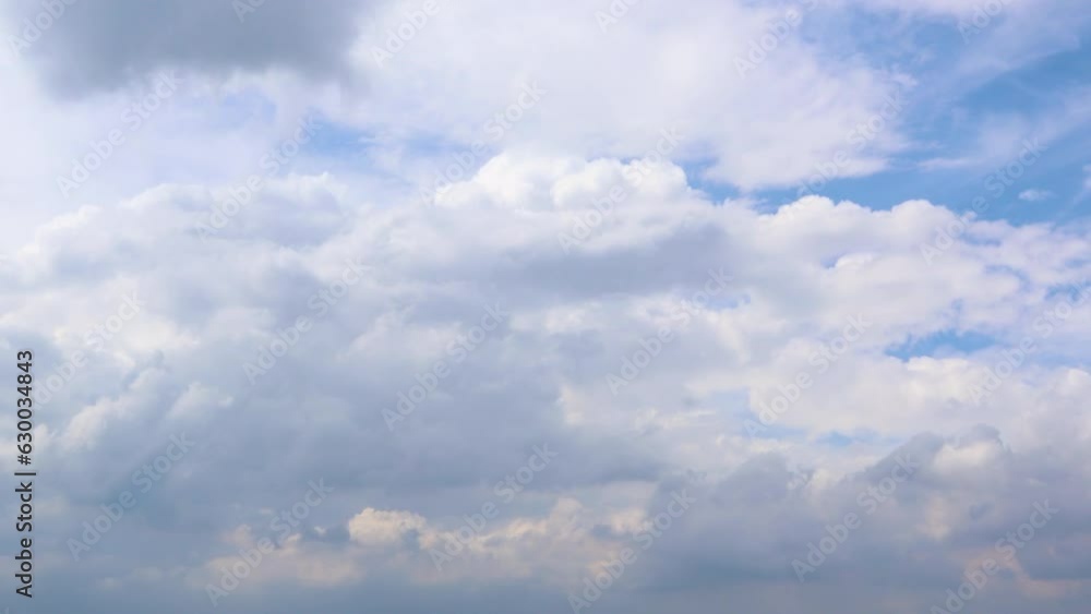 Time lapse beautiful clear blue sky with moving clouds. Puffy fluffy beautiful white clouds. Clear weather blue sky with copy space. Cumulus cloud cloudscape time lapse nature concept background. Time lapse beautiful clear blue sky with moving clouds. Puffy fluffy beautiful white clouds. Clear weather blue sky with copy space. Cumulus cloud cloudscape time lapse nature concept background.
