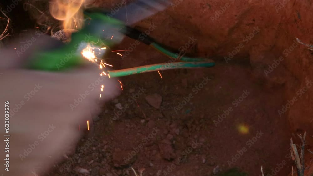 Grounding system using copper wires connected to copper rods buried in