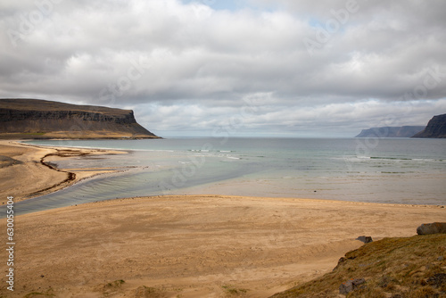 A beautiful sand beach next to a fjord in Iceland, Westfjords.