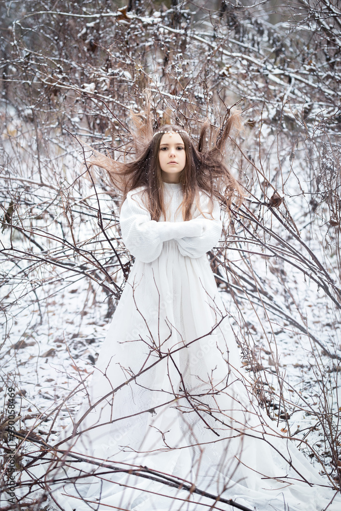 girl nymph in the snowy forest girl nymph in the snowy forest