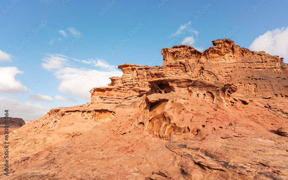 Red orange sandstone rocks formations in Wadi Rum also known as Valley of the Moon desert, Jordan