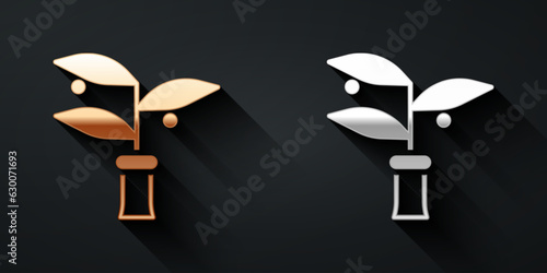 Gold and silver Plant breeding icon isolated on black background. Plants growing in the test tubes. Organic food ,agriculture and hydroponic. Long shadow style. Vector