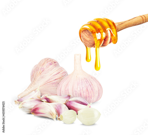 dripping honey and garlic isolated on a white background