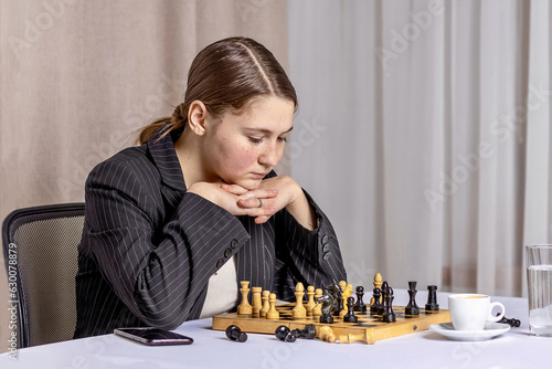 Girl playing chess