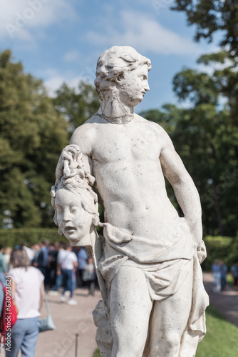 An ancient stone statue in the garden of the Catherine Palace in Tsarskoe Selo  Pushkin  close-up.