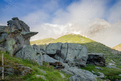 The Monte Rosa and Punta Gnifetti paks in the morning clouds - Valle Anzasca valley. photo