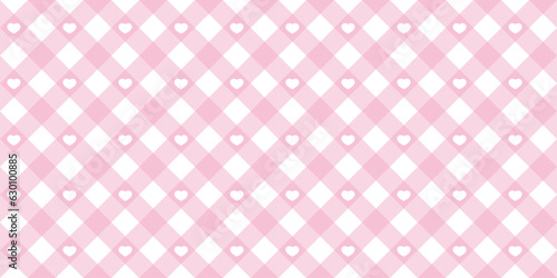 Gingham heart diagonal seamless pattern in pink pastel color. Vichy plaid design for Easter holiday textile decorative. Vector checkered pattern for fabric - picnic blanket, tablecloth, dress, napkin.