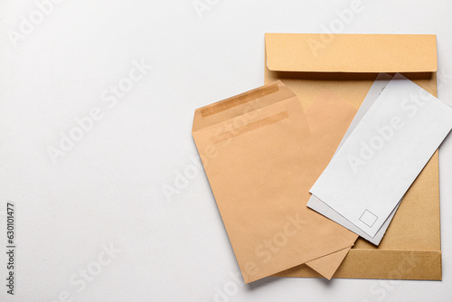 Letters and envelopes on light background
