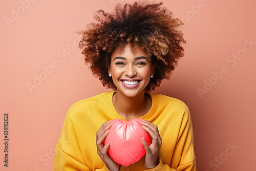 Portrait of a happy African American woman. © ЮРИЙ ПОЗДНИКОВ