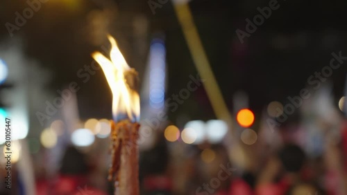 Protesters in Israel march with tourches during protest against judicial reform photo