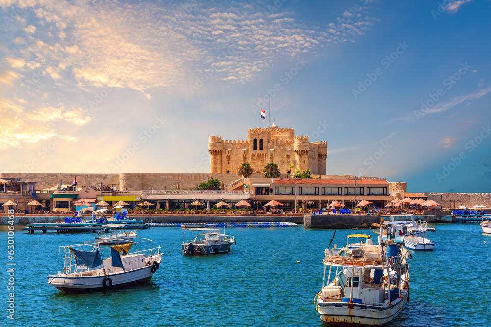 Boats in the harbour near famous Citadel of Qaitbay, Alexandria, Egypt