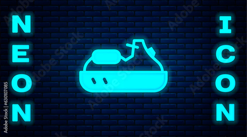 Glowing neon Jet ski icon isolated on brick wall background. Water scooter. Extreme sport. Vector