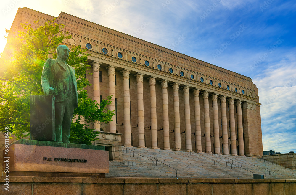Parliament house of Finland with Svinhufvud statue in front of it and ...