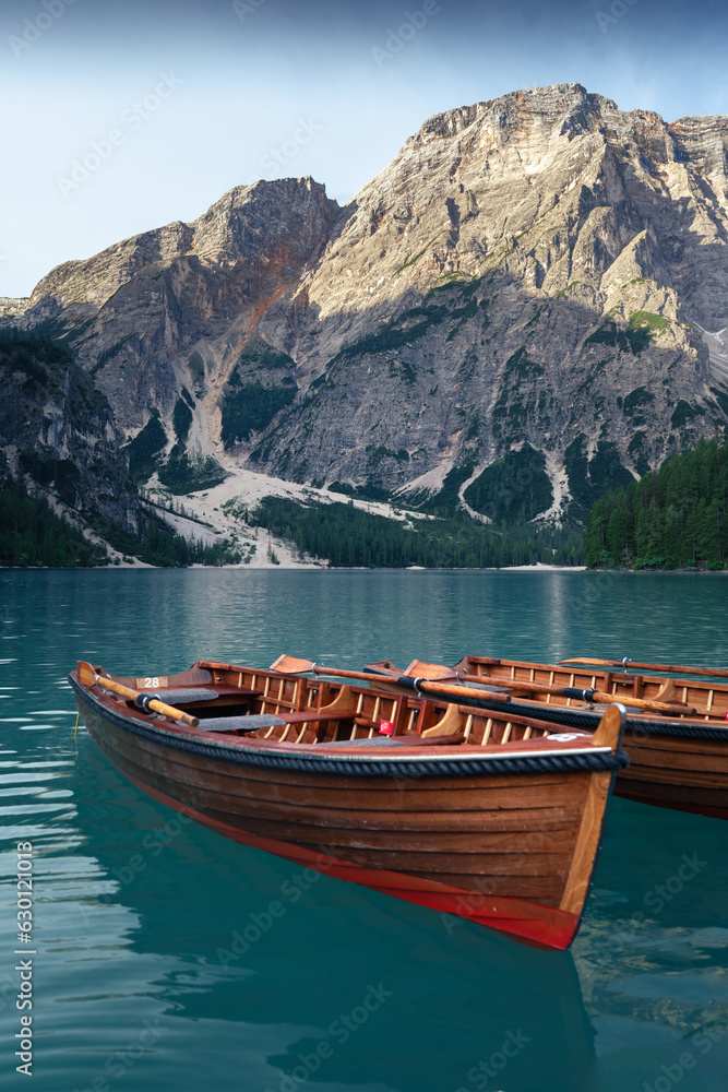 Stunning romantic place with typical wooden boats on the alpine lake,(Lago di Braies) Braies lake,Dolomites,South Tyrol,Italy,Europe