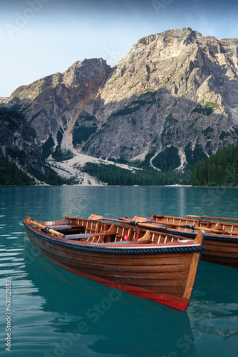Stunning romantic place with typical wooden boats on the alpine lake,(Lago di Braies) Braies lake,Dolomites,South Tyrol,Italy,Europe