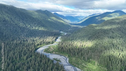 On the Olympic Peninsula, the Hoh river flows through one of the largest temperate rainforests in the U.S. Receiving over 100 inches of rain annually, this mountainous area is lush with biodiversity. photo