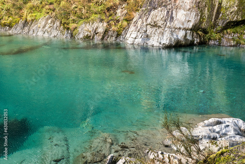 Nestled among mature beech and podocarp forest, these pools of deep, clear water flowing into the Makarora River offer a moment of tranquillity. This is one of our best short walks photo