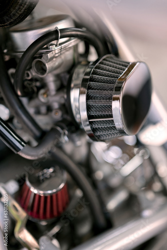 Powerful Engine Close-Up: Unveiling the Mechanical Marvel of a Motorbike © MG