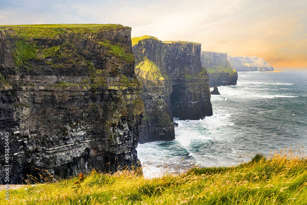 Scenic view of the Cliffs of Moher in summer at sunrise