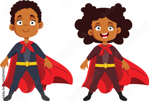 Two Superhero Kids Wearing Red Capes Vector Cartoon Set. Cheerful little children wearing superhero costumes 
