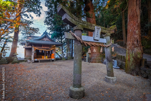 Yufuin, Japan - Nov 27 2022: Tenso-jinja shrine at lake Kinrin, is one of the representative sightseeing spots in the Yufuin area at the foot of Mount Yufu.