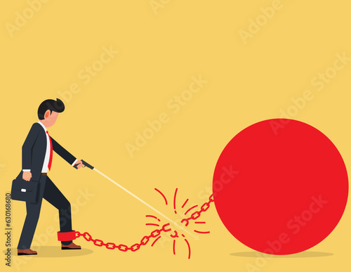 Financial freedom. Businessman breaking a chain with a gun