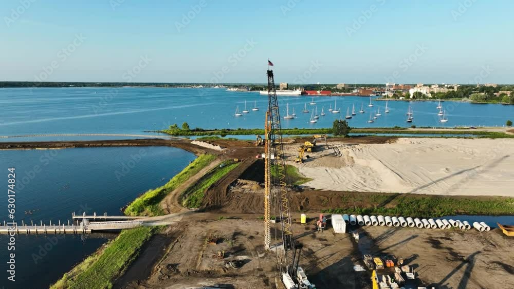 Pushing forward to a waving flag on a barge crane. Pushing forward to a waving flag on a barge crane.