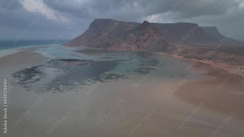 Cloudy Sky Over Detwah Lagoon On The Coast Of Socotra In Yemen. wide aerial Cloudy Sky Over Detwah Lagoon On The Coast Of Socotra In Yemen. wide aerial