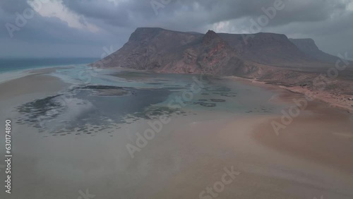 Cloudy Sky Over Detwah Lagoon On The Coast Of Socotra In Yemen. wide aerial photo