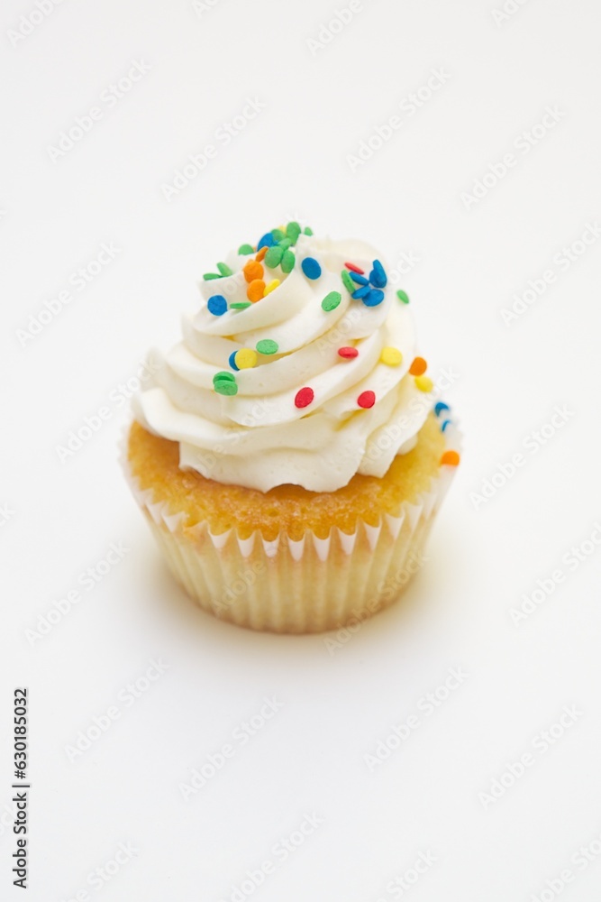 cupcake with icing and sprinkles