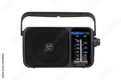 Radio receiver on a white background. Black portable wireless radio close-up isolated on a white background.